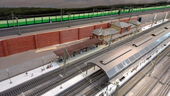 Bahnsteig mit bewegenden Preiserlein eingebaut.